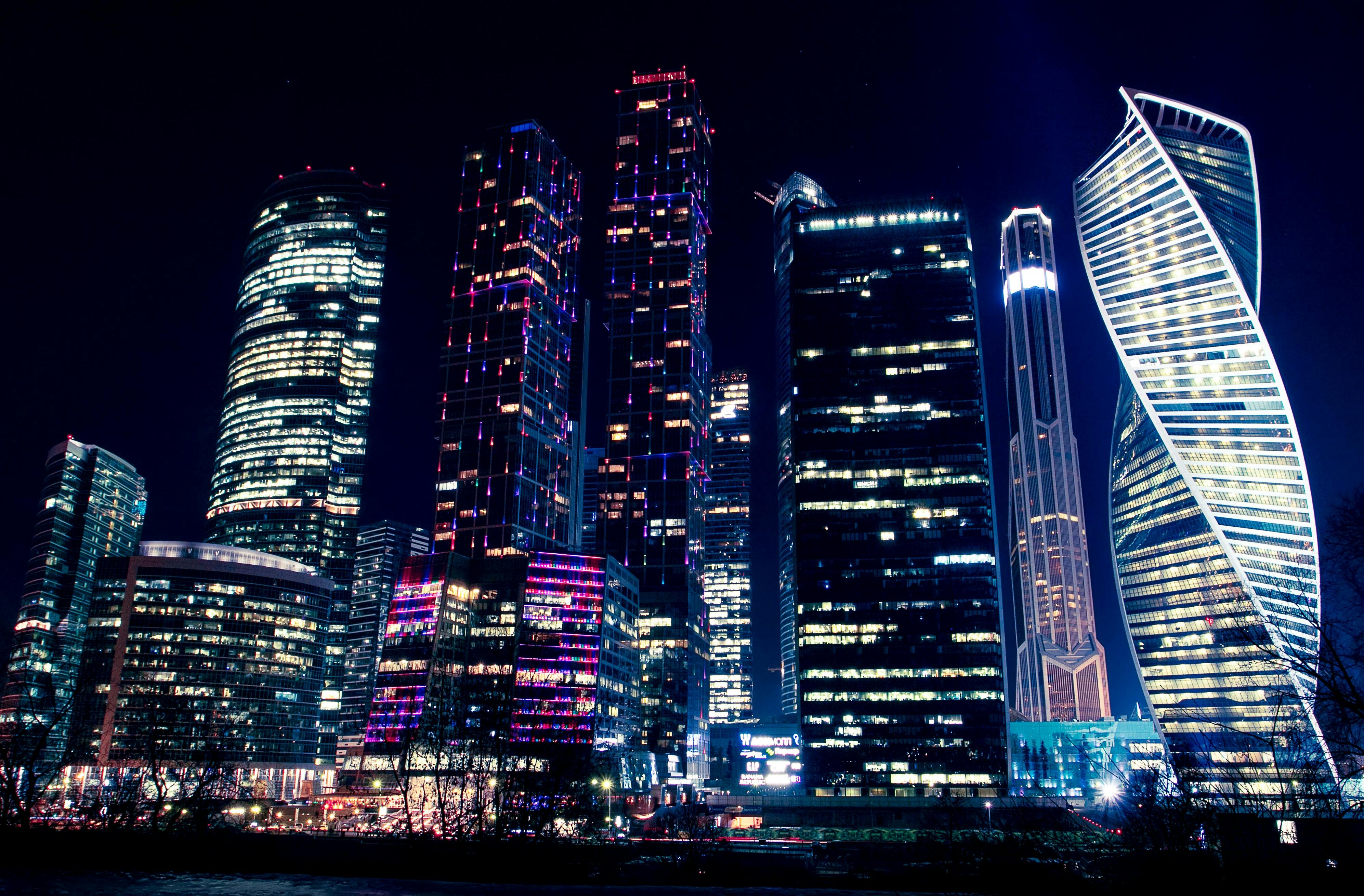 Tall buildings at night in Moscow.